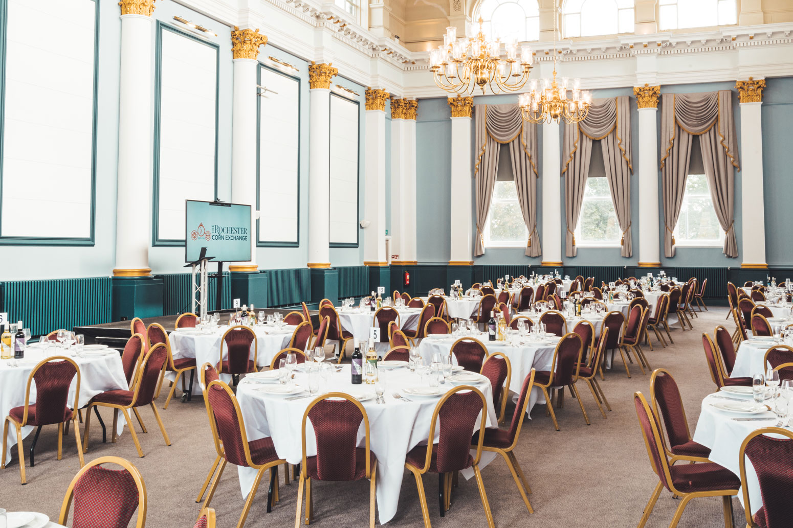 The Corn Exchange business hall with tables and chairs.